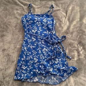 blue and white dress with a wrap-around waist